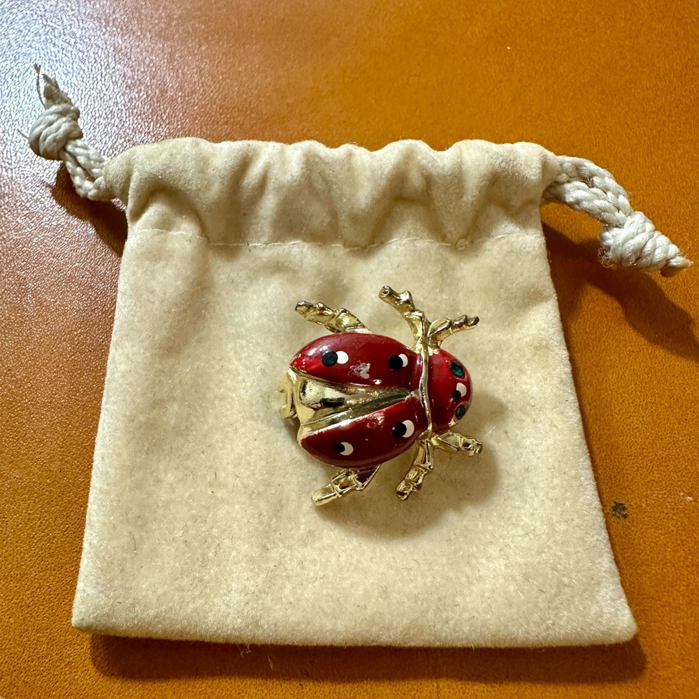 Vintage ladybug brooch green eyes and enamel detail red/black/white. Cute!